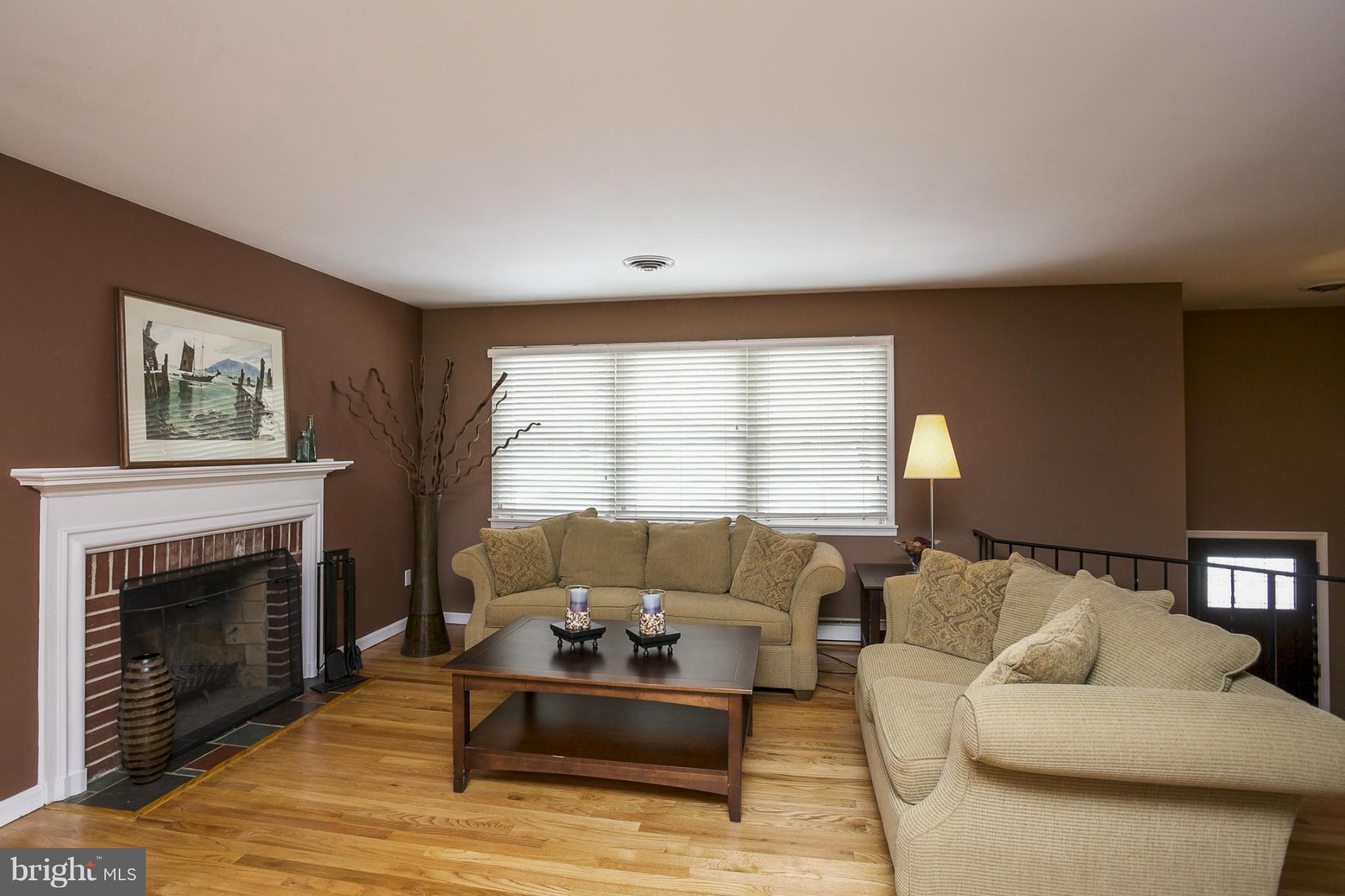 1712 Parkvue Road Fallston, MD 21047 - Photo 3 of 29 a living room with furniture and a fireplace