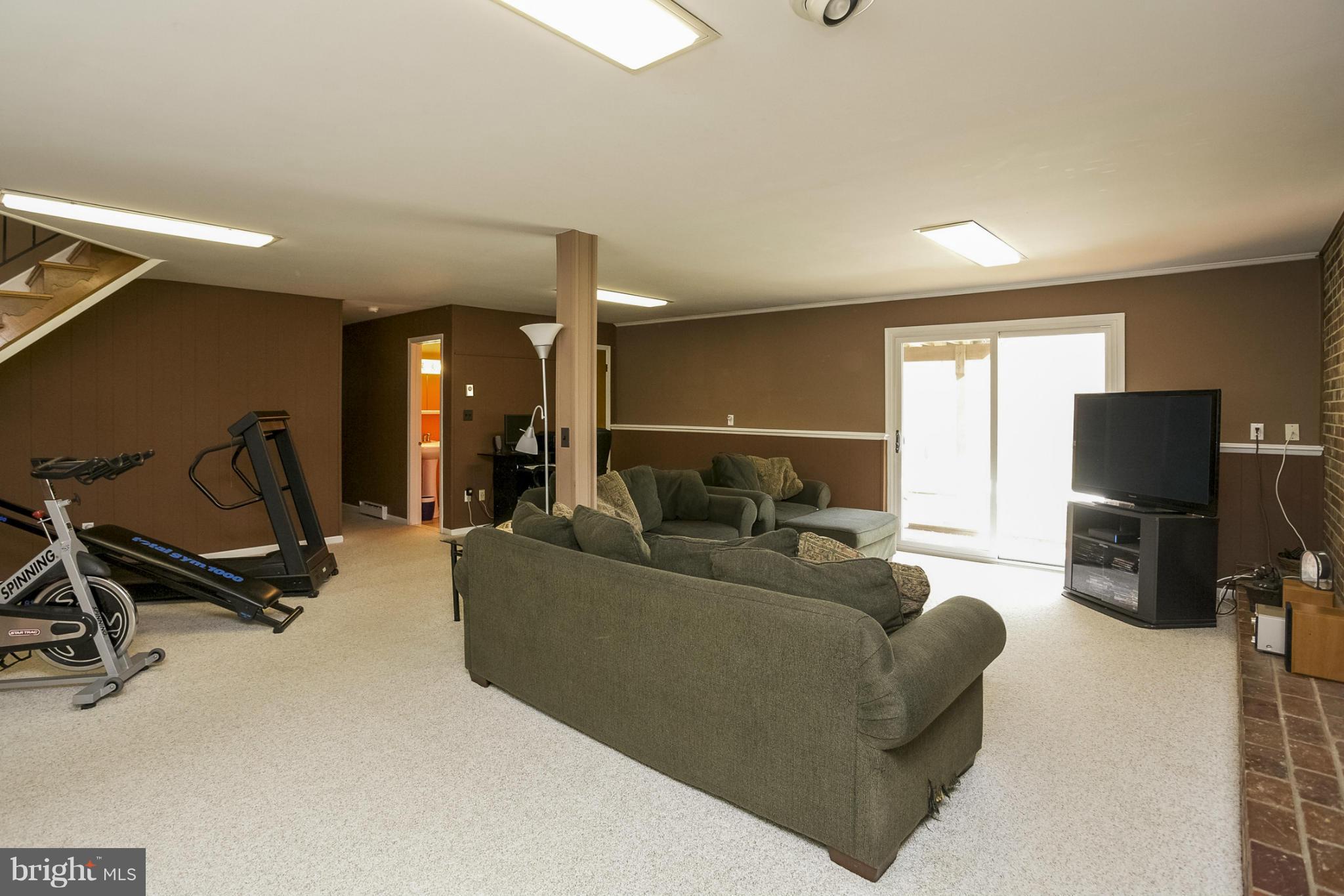1712 Parkvue Road Fallston, MD 21047 - Photo 23 of 29 a living room with furniture and a flat screen tv