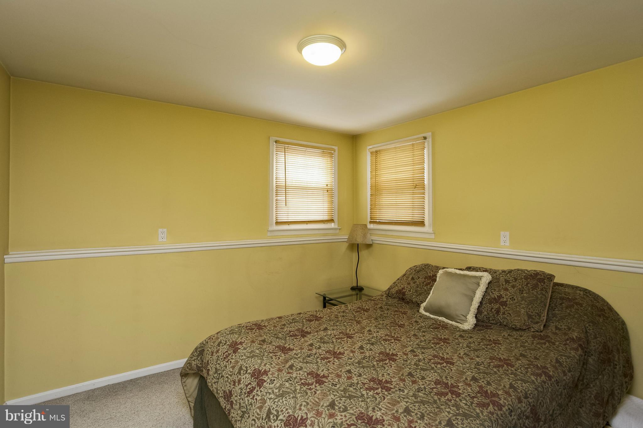 1712 Parkvue Road Fallston, MD 21047 - Photo 24 of 29 a bedroom with a bed and wooden floor