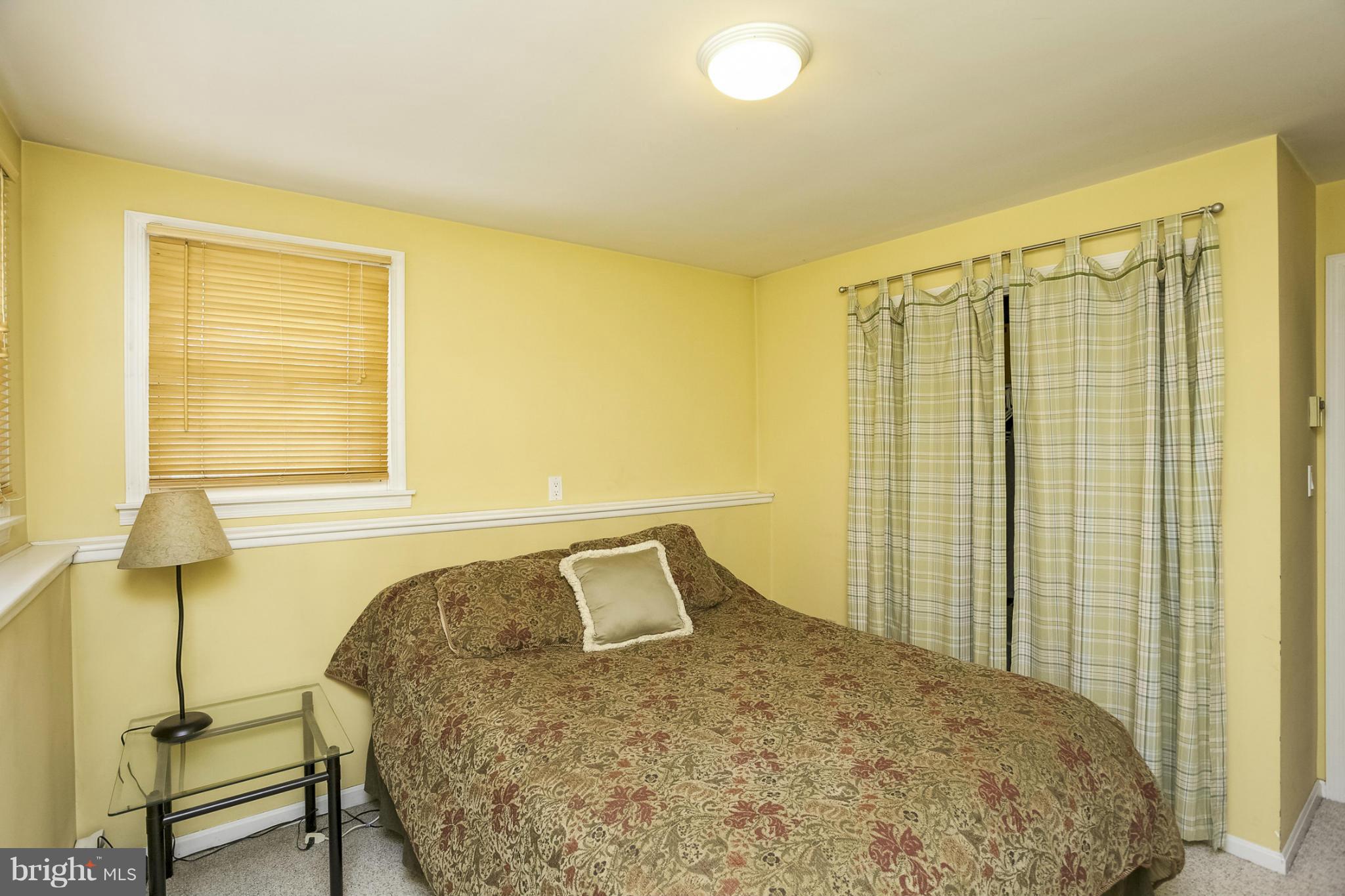 1712 Parkvue Road Fallston, MD 21047 - Photo 25 of 29 a bedroom with a bed and chair