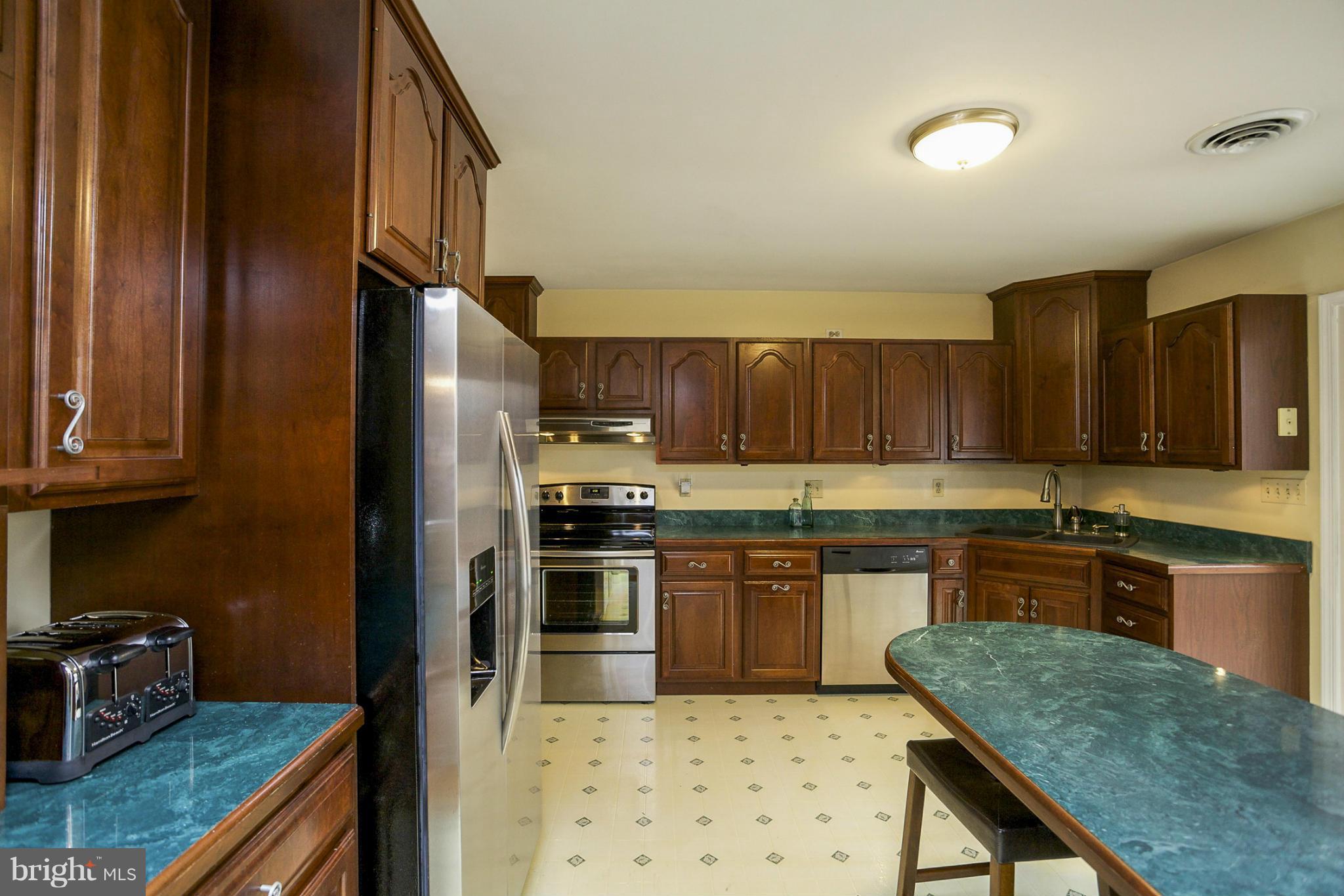 1712 Parkvue Road Fallston, MD 21047 - Photo 10 of 29 a kitchen with granite countertop a sink stainless steel appliances and cabinets