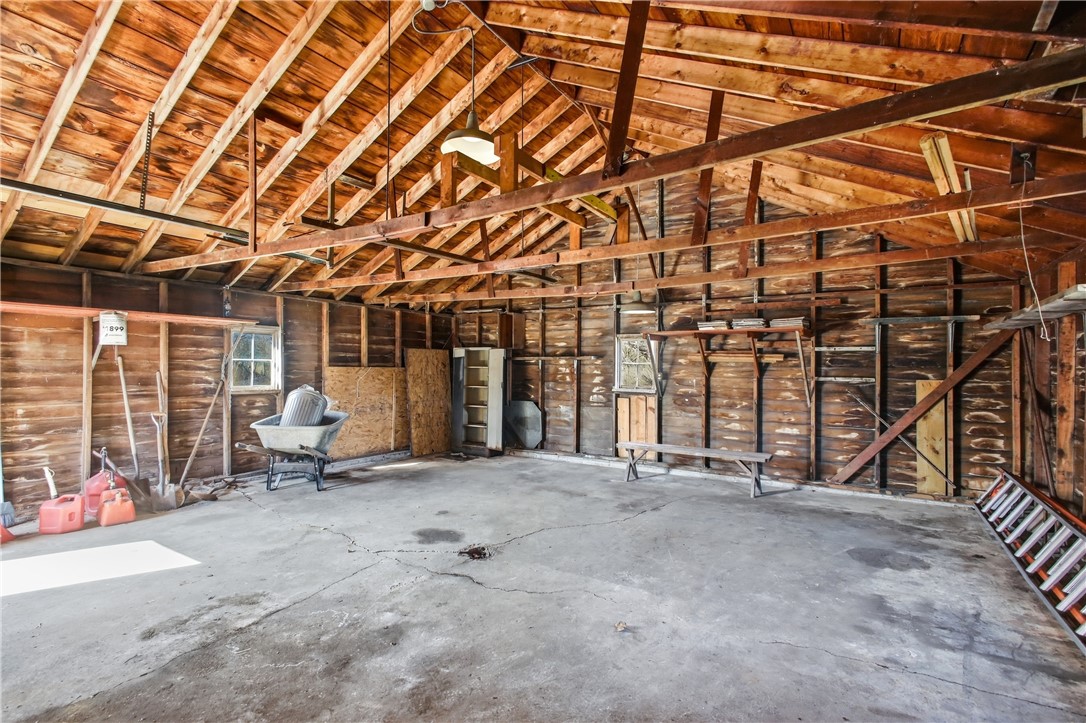 1925 Sunset Avenue Springfield, OH 45505 - Photo 44 of 45 This spacious garage offers ample room for vehicles and storage, featuring durable concrete flooring.