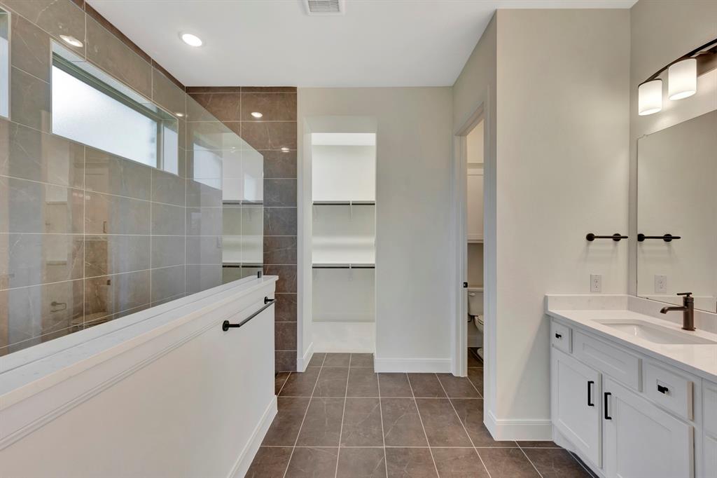 2901 Long Trail Mansfield, TX 76063 - Photo 13 of 28 a bathroom with a sink and a mirror