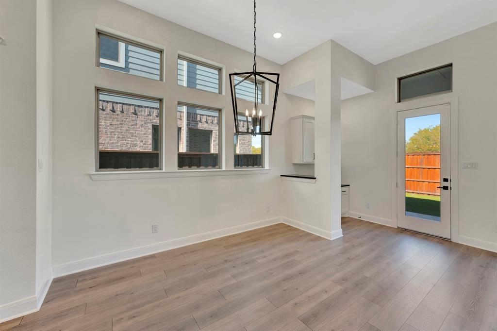2901 Long Trail Mansfield, TX 76063 - Photo 24 of 28 a view of an empty room with wooden floor and a window