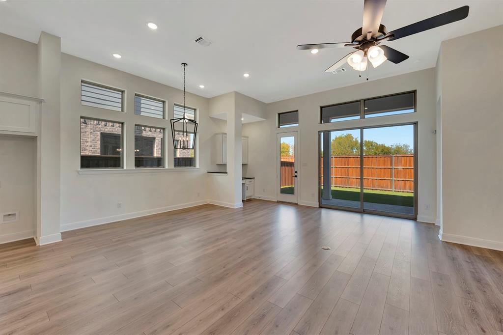 2901 Long Trail Mansfield, TX 76063 - Photo 8 of 28 wooden floor in an empty room with a window