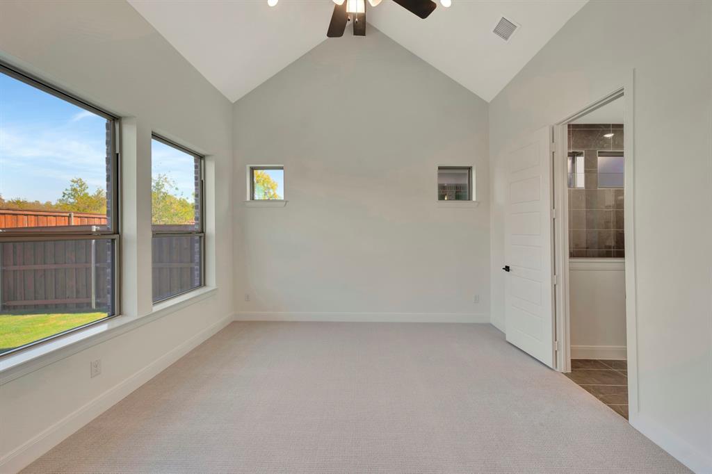 2901 Long Trail Mansfield, TX 76063 - Photo 10 of 28 an empty room with glass door and windows