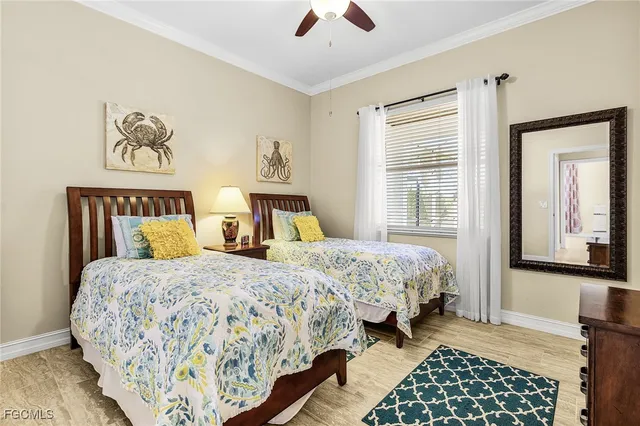 a bedroom with double bed and a window