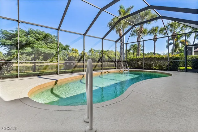 a view of a swimming pool with a garden