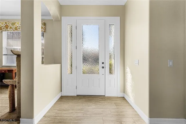 a view of a bathroom from the hallway