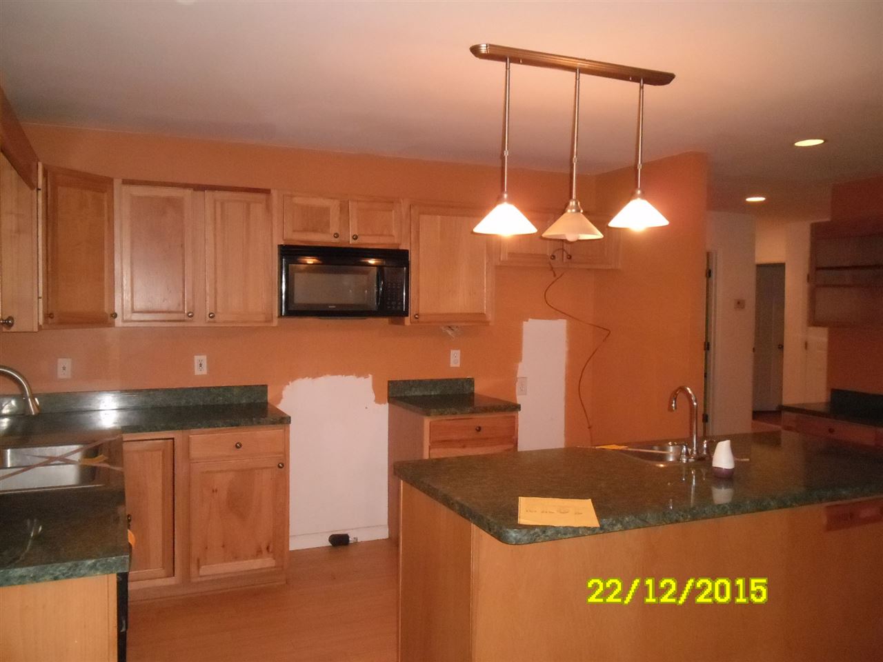 35 Begum Road Palmyra, VA 22963 - Photo 4 of 28 a kitchen with granite countertop a stove a sink and a microwave