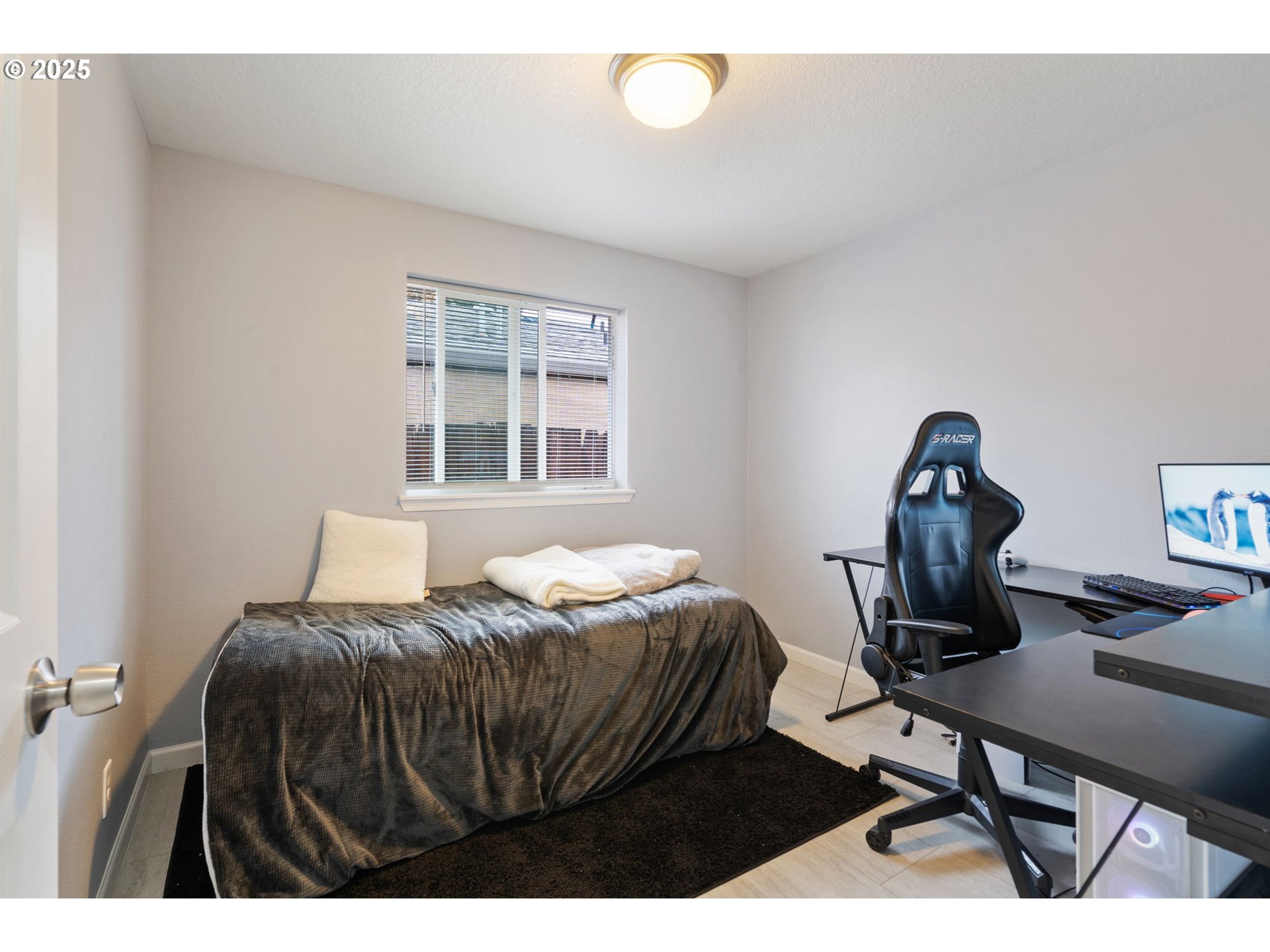 453 North 11th Street St. Helens, OR 97051 - Photo 14 of 20 a bedroom with a bed window and a desk