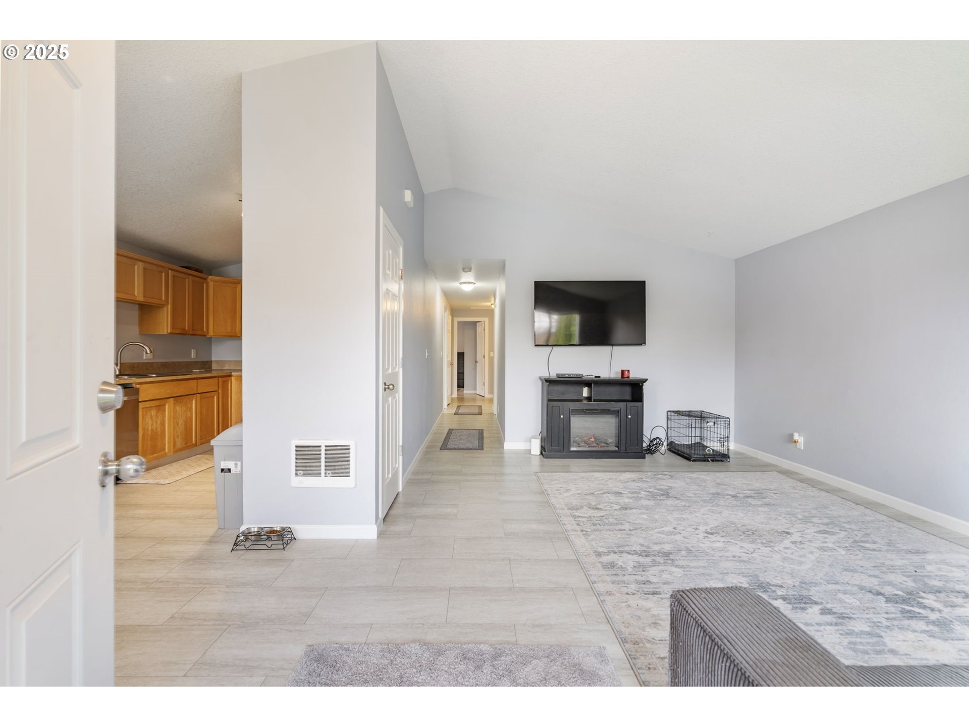 453 North 11th Street St. Helens, OR 97051 - Photo 2 of 20 a view of a livingroom with furniture and a flat screen tv