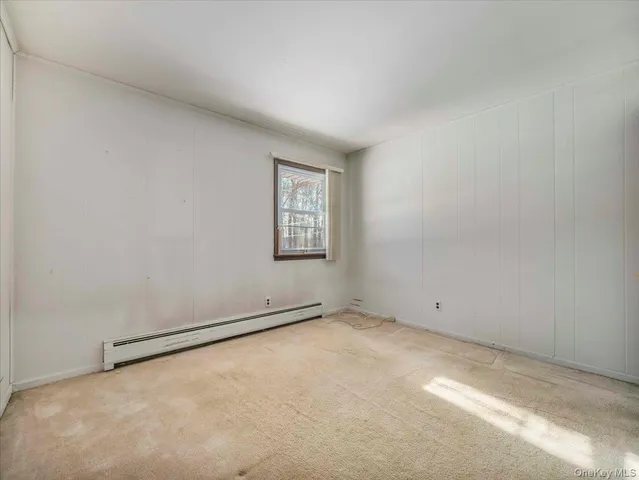 a view of a livingroom and a utility room