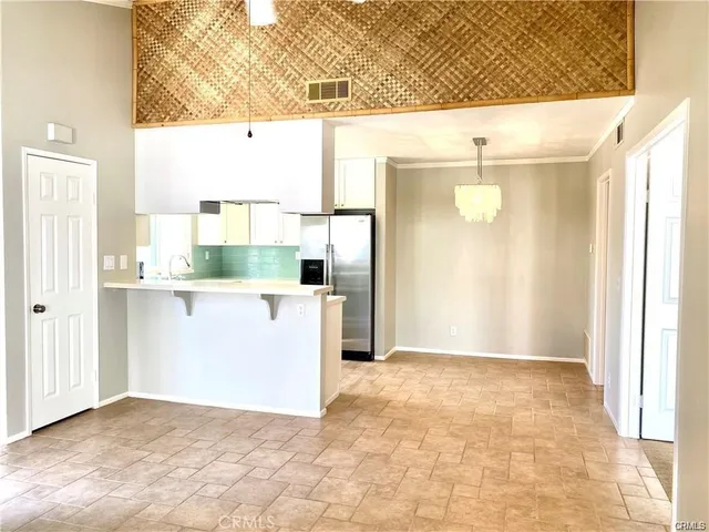 a view of a kitchen with a window