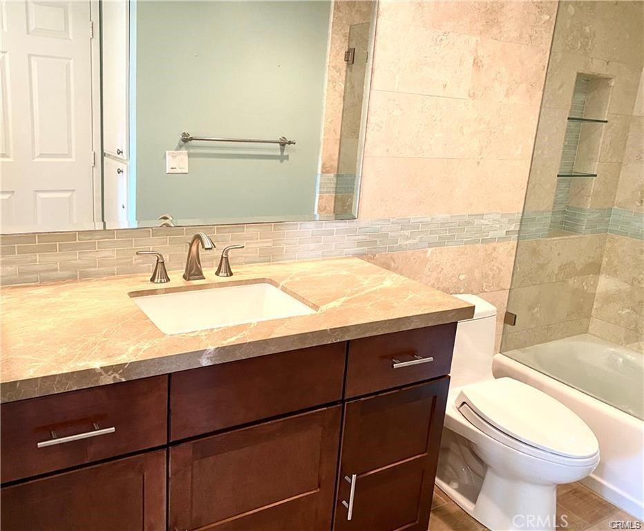 34026 Selva Road, Unit 69 Dana Point, CA 92629 - Photo 9 of 10 a bathroom with a sink and a toilet
