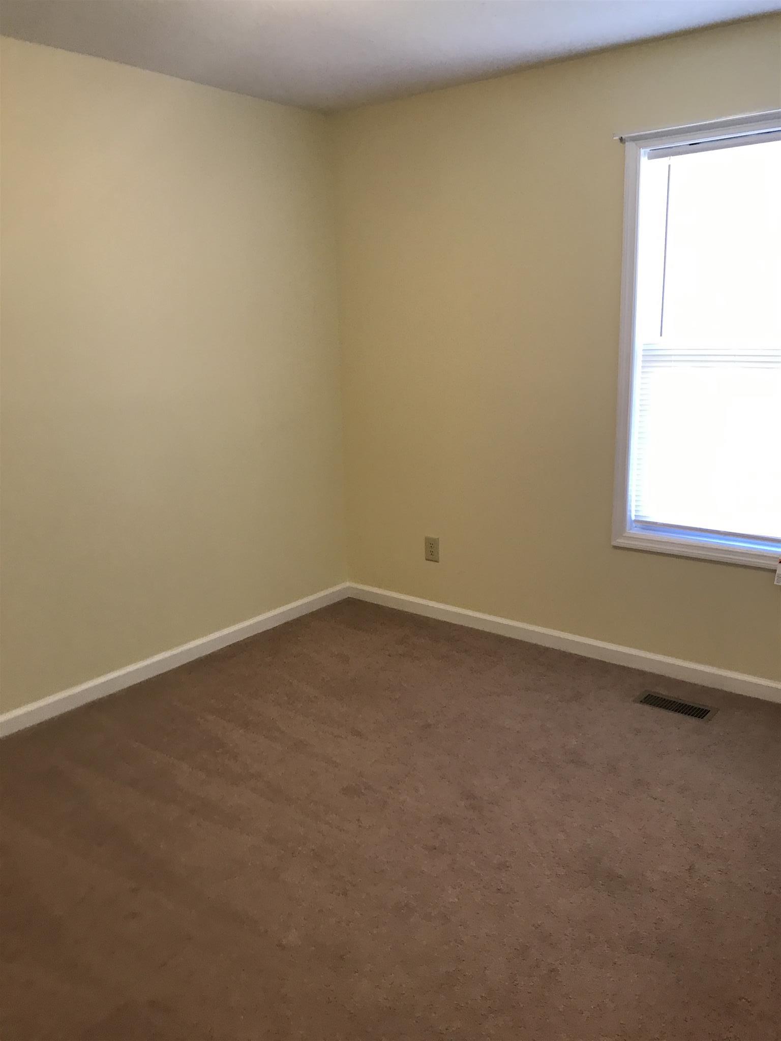 957 Shelly Road Decherd, TN 37324 - Photo 8 of 16 an empty room with a window