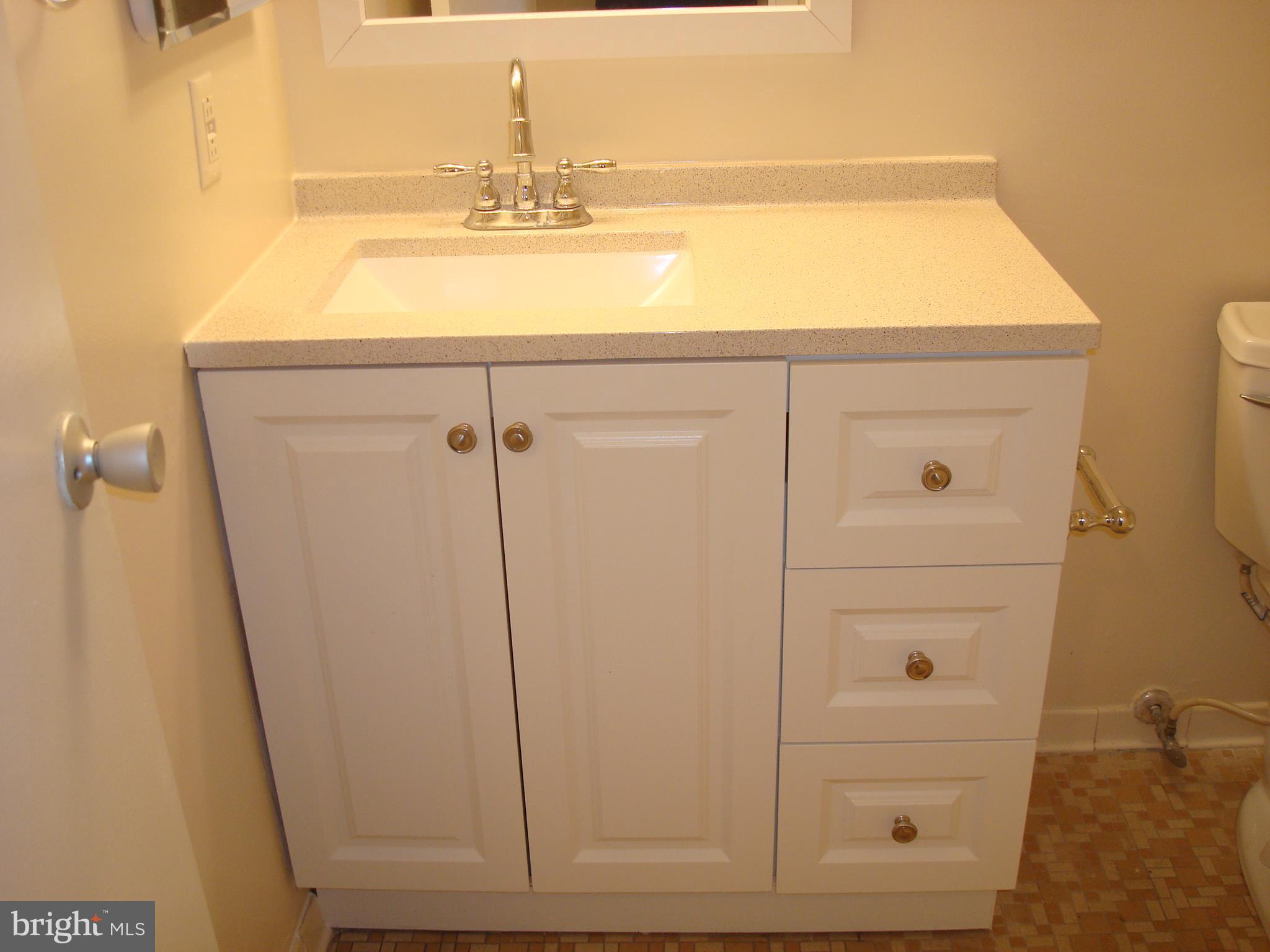 18612 Walkers Choice Road, Unit 2 Gaithersburg, MD 20886 - Photo 16 of 26 New vanity, mirror, rods & light fixture