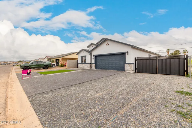 a house view with a backyard space