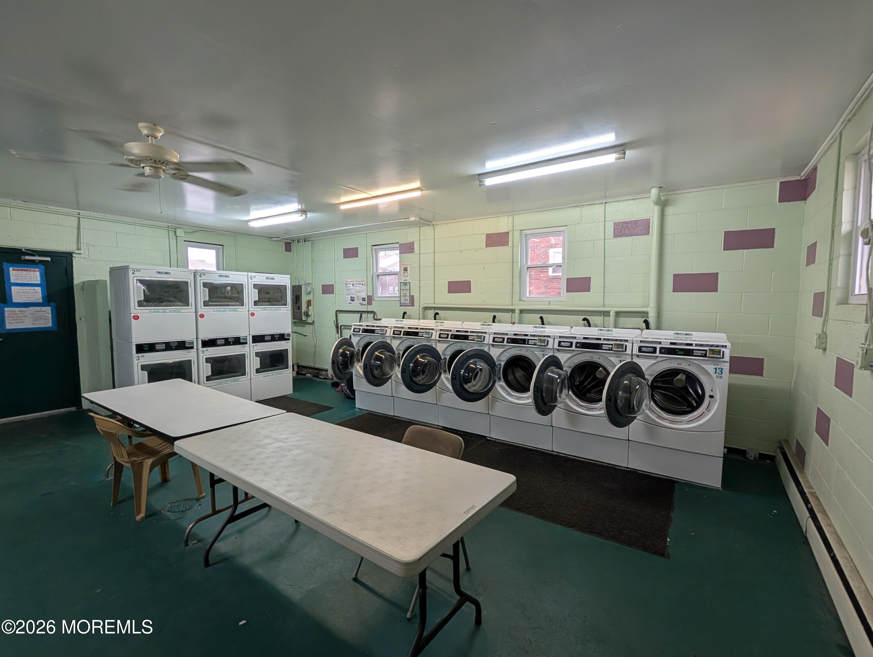 167 Wyckoff Road, Unit B Eatontown, NJ 07724 - Photo 14 of 15 a kitchen with a table and chairs