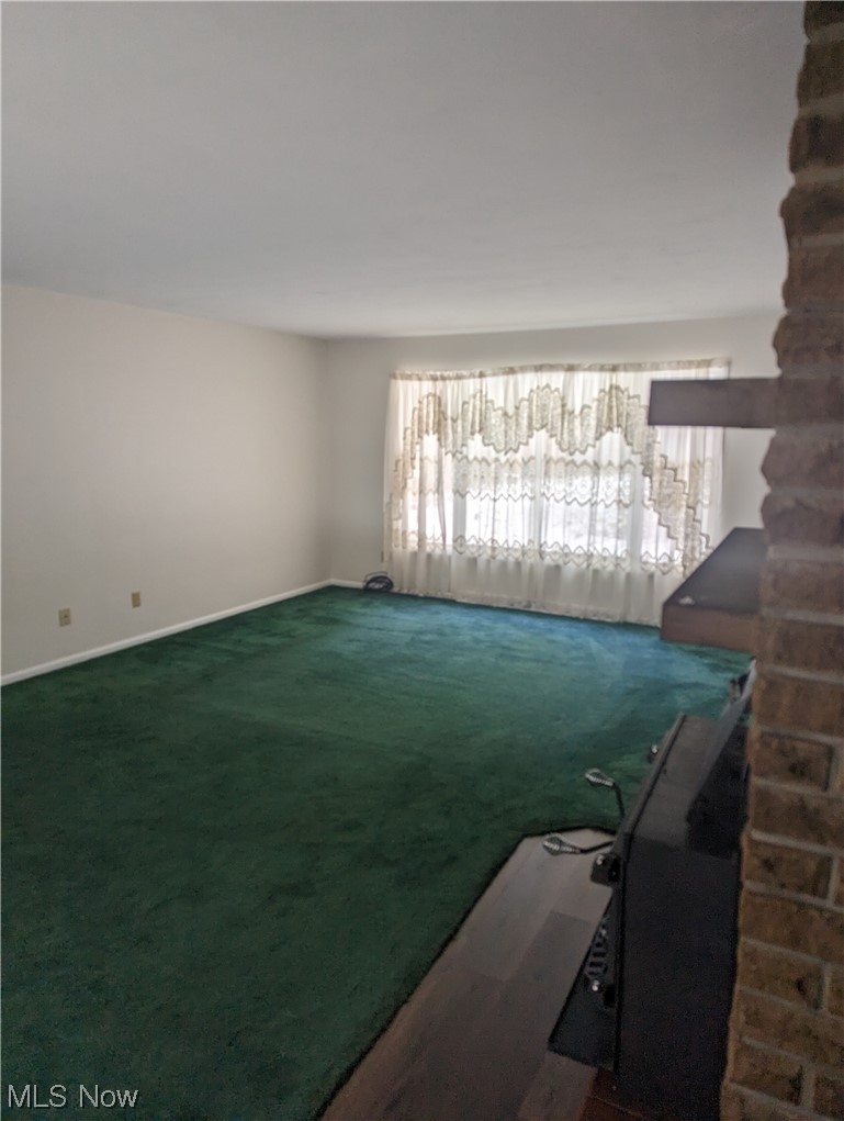 276 Paradise Road Painesville, OH 44077 - Photo 6 of 31 View of carpeted spare room