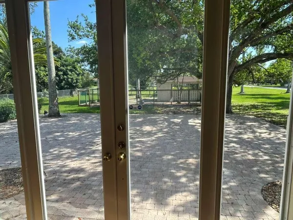 a view of a porch with a yard