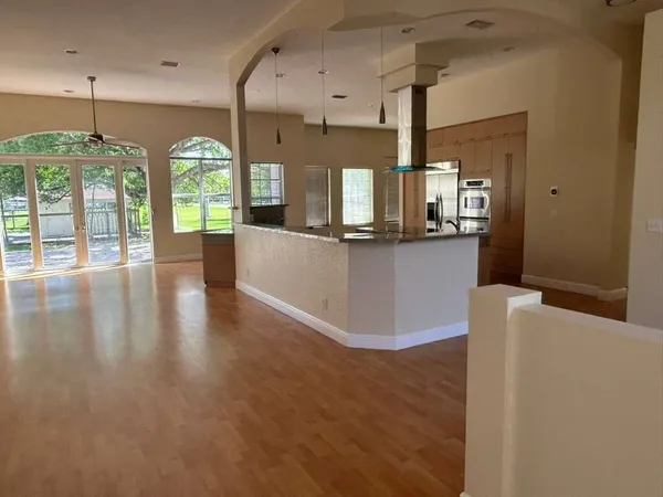 a kitchen with sink and window