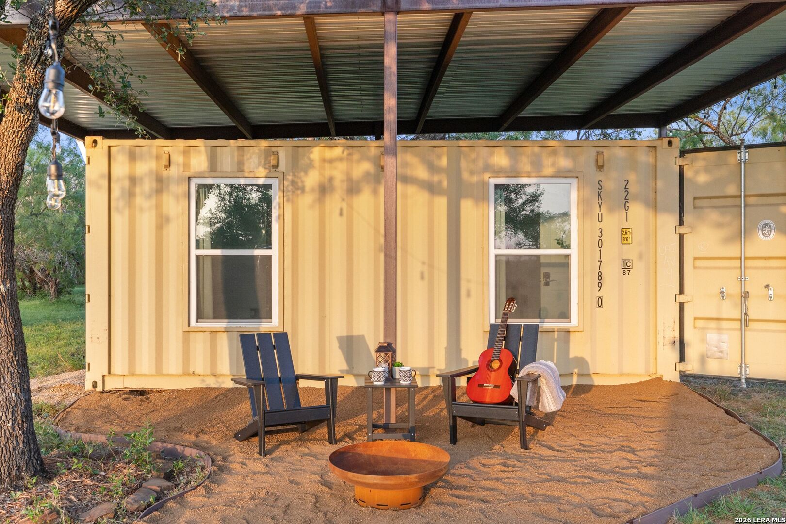 3402 Mormon Mill Road Marble Falls, TX 78654 - Photo 10 of 29 a outdoor space with patio furniture and potted plants
