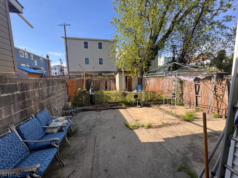 321 South 5th Street Elizabeth, NJ 07202 - Photo 2 of 10 a view of a patio with iron fence