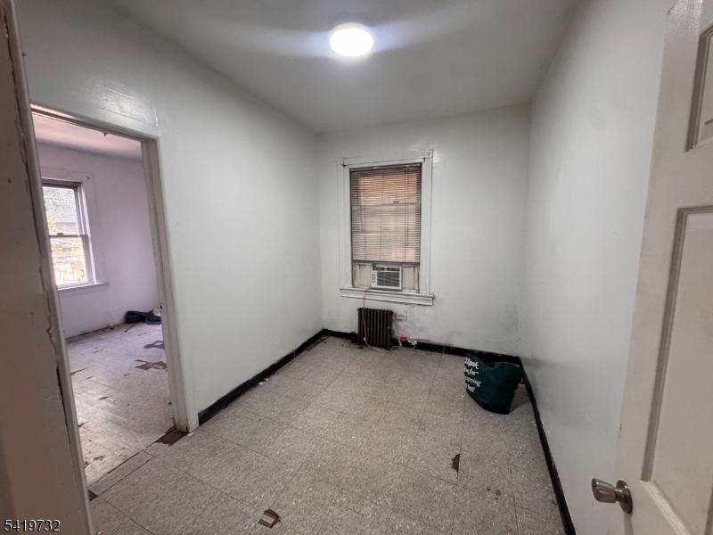 321 South 5th Street Elizabeth, NJ 07202 - Photo 10 of 10 an empty room with windows