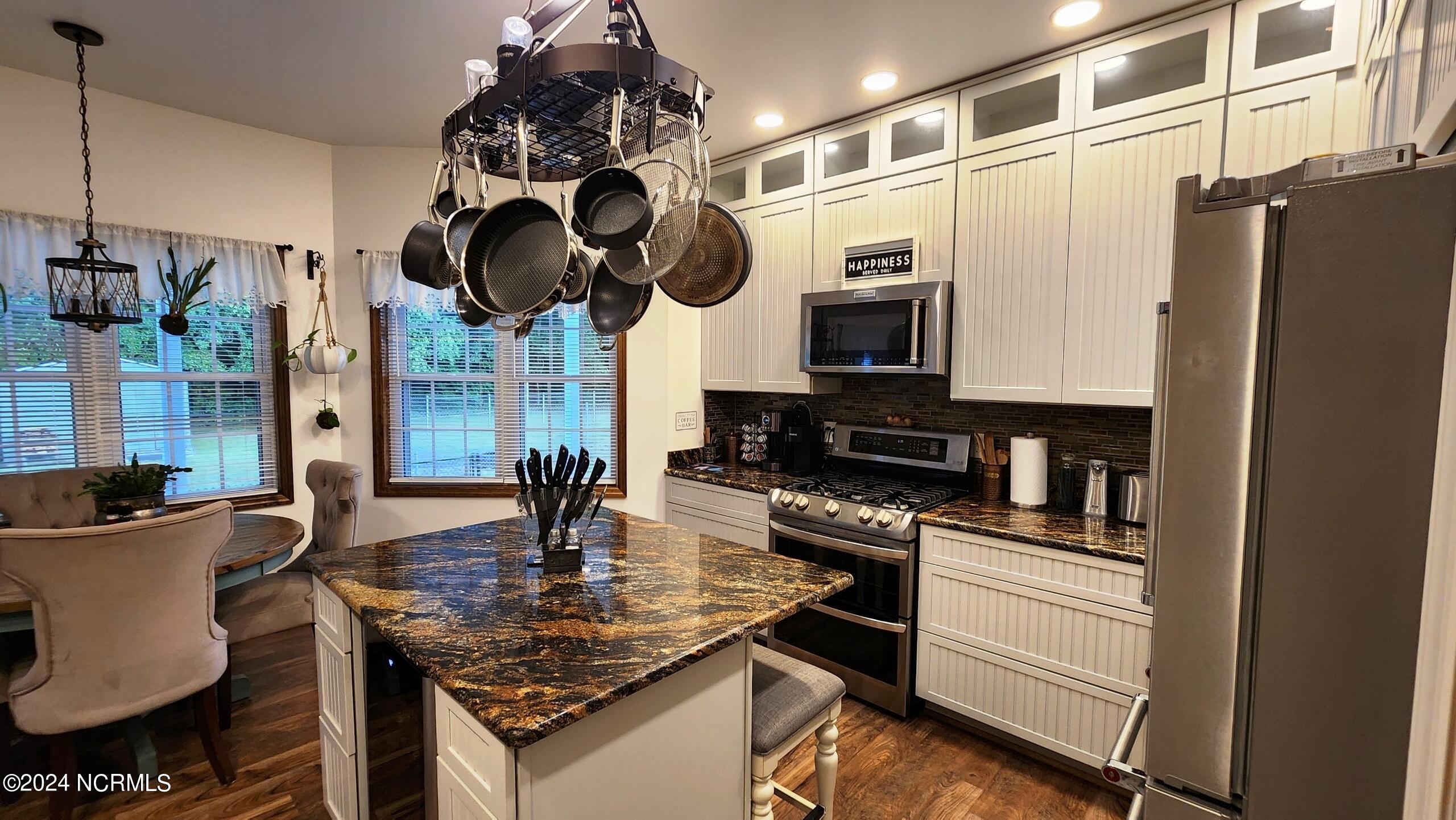 1613 Webbs Chapel Road Macclesfield, NC 27852 - Photo 9 of 40 Kitchen with top of the line appliances, island with wine fridge