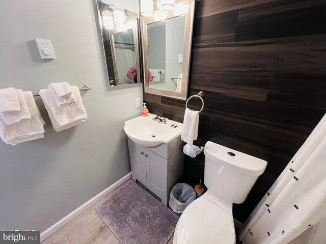 a bathroom with a sink and toilet