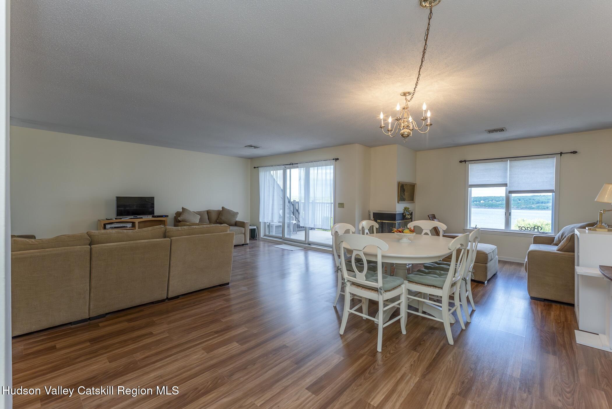 17 Riverview Port Ewen, NY 12487 - Photo 11 of 44 a view of a dining room with furniture window and wooden floor