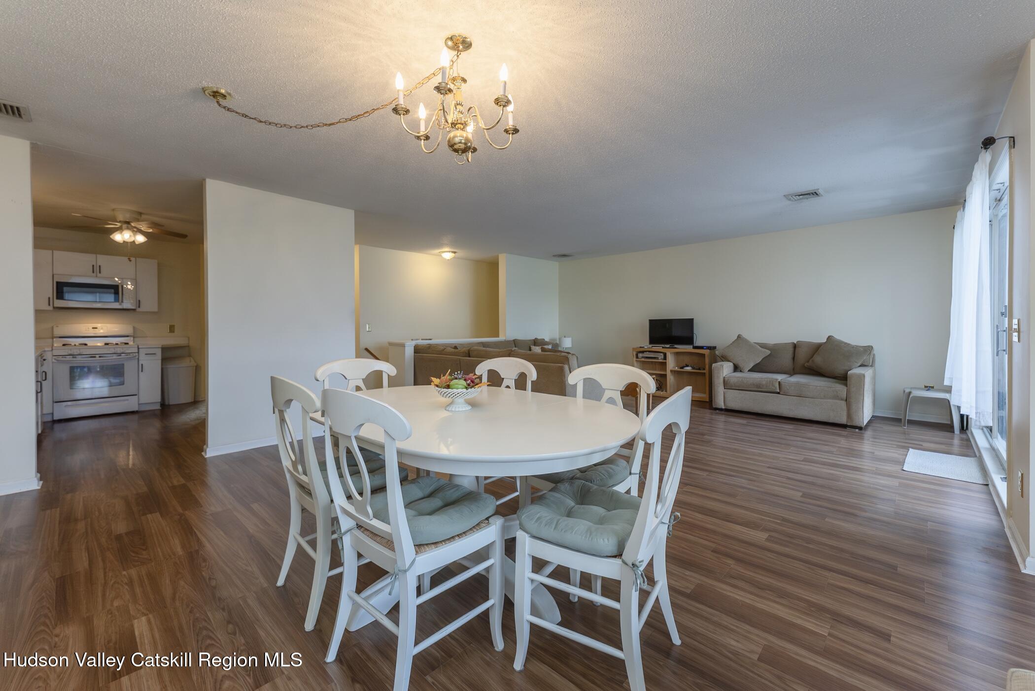 17 Riverview Port Ewen, NY 12487 - Photo 16 of 44 a view of a dining room with furniture and wooden floor