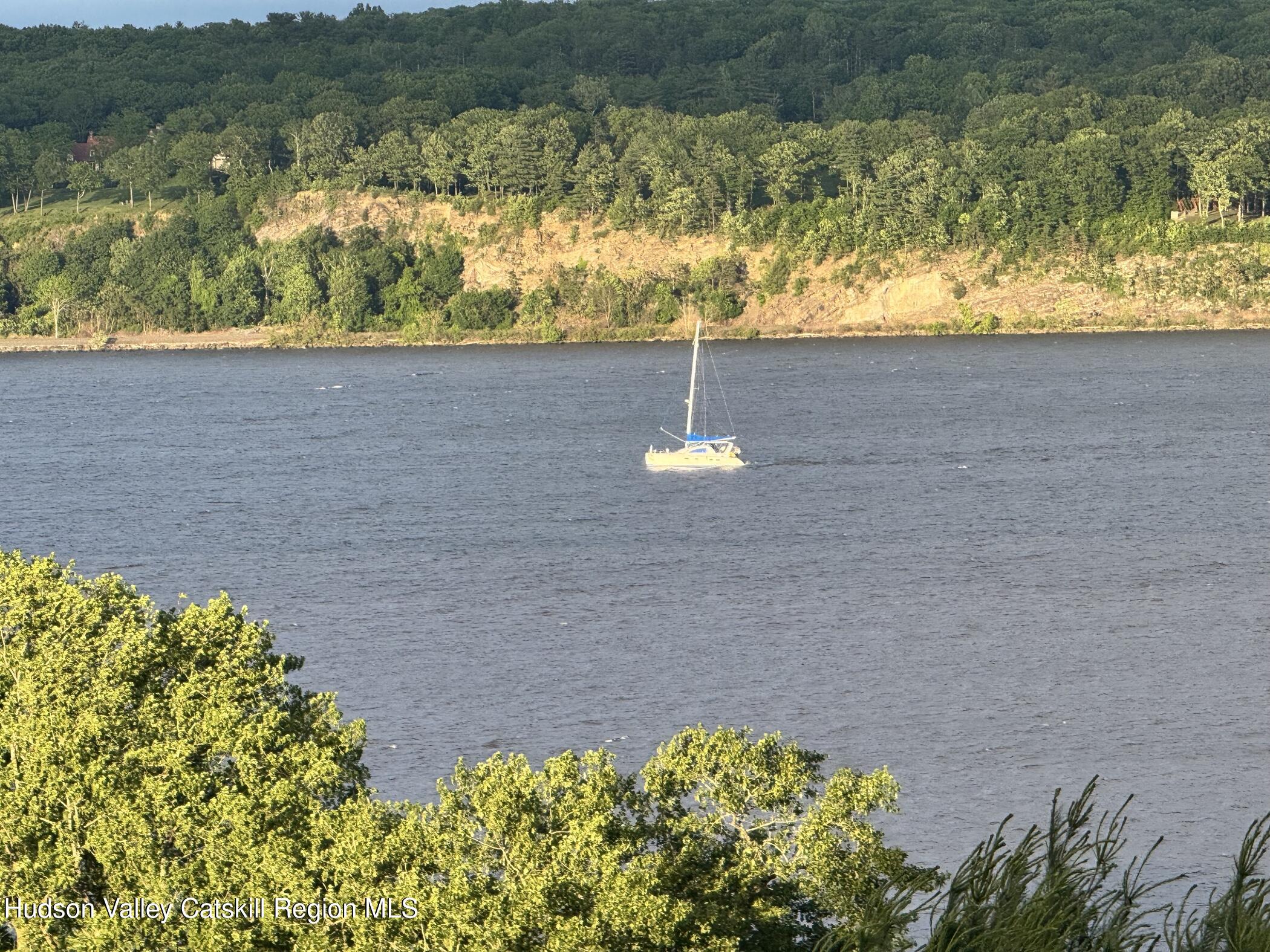 17 Riverview Port Ewen, NY 12487 - Photo 2 of 44 a view of a lake with a mountain in the background
