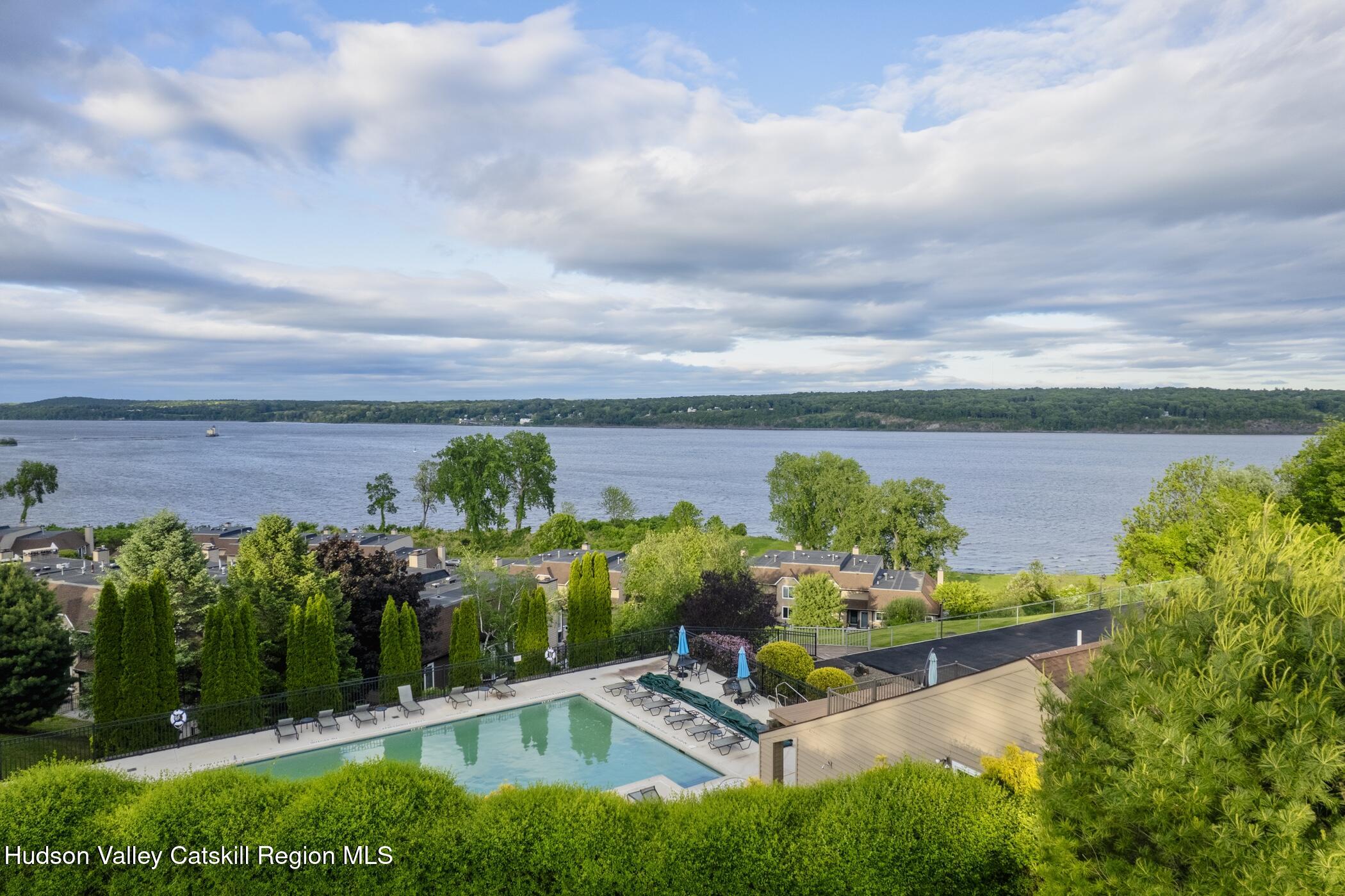 17 Riverview Port Ewen, NY 12487 - Photo 39 of 44 a view of a lake with a floor to ceiling room with lots of green space
