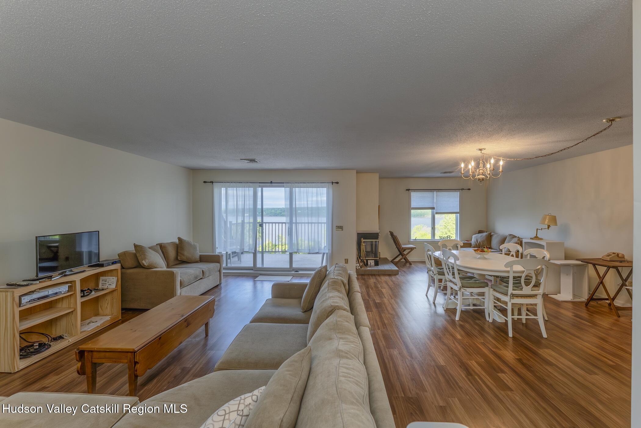 17 Riverview Port Ewen, NY 12487 - Photo 6 of 44 a living room with furniture and a wooden floor