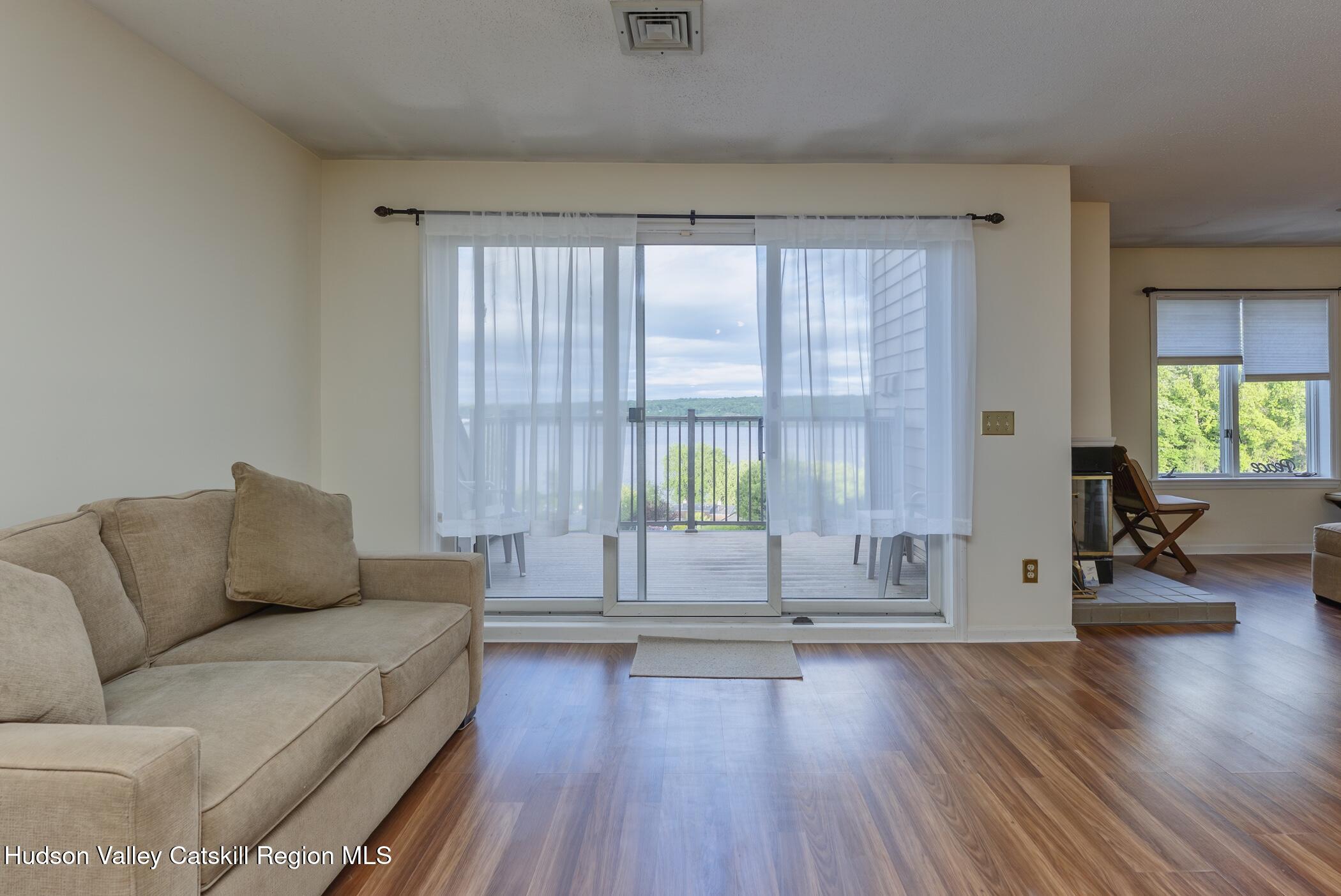 17 Riverview Port Ewen, NY 12487 - Photo 8 of 44 a living room with furniture and a large window