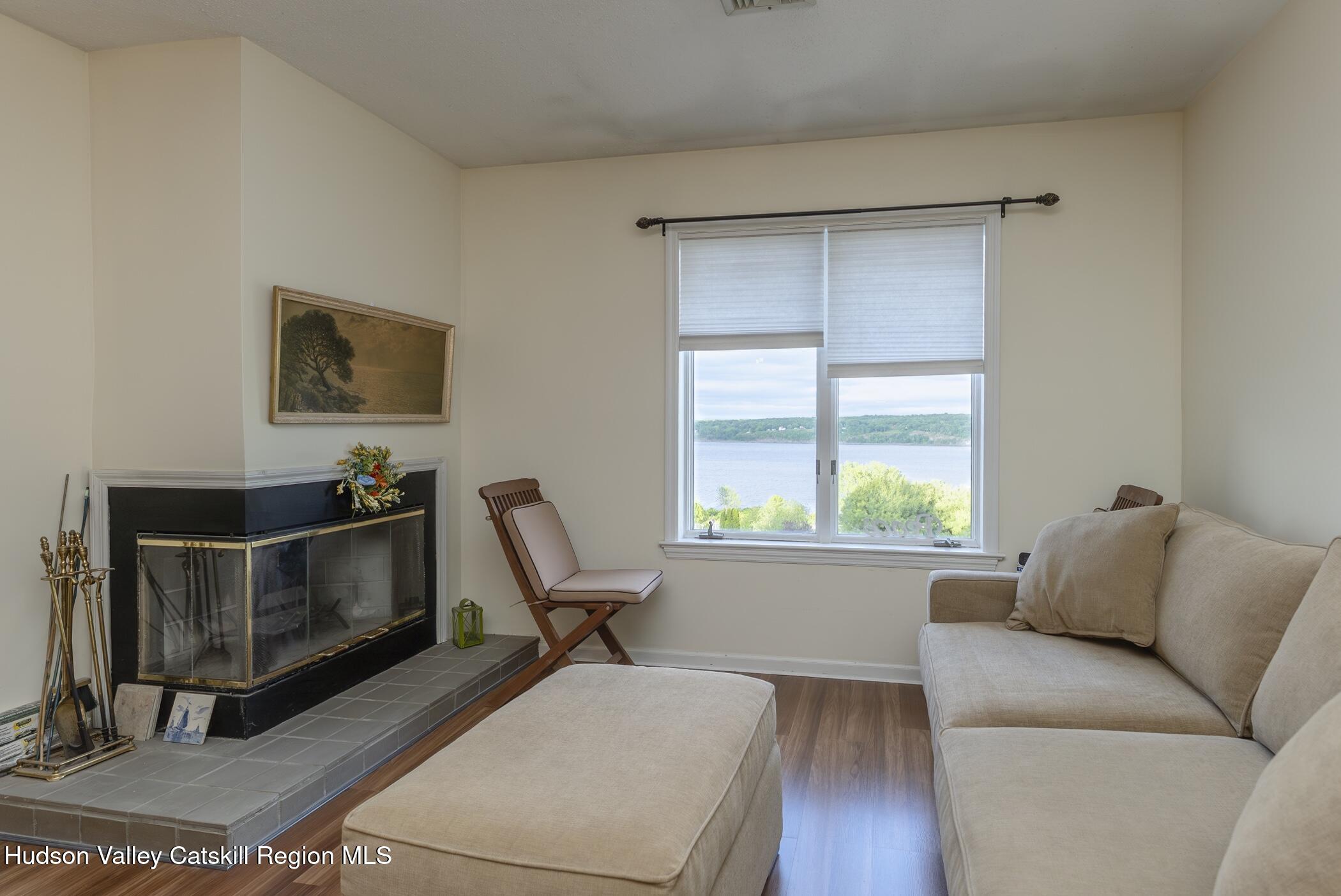 17 Riverview Port Ewen, NY 12487 - Photo 9 of 44 a living room with a couch and a window