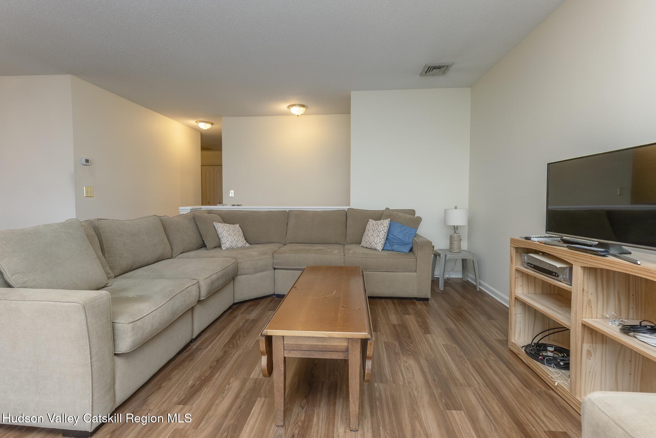 17 Riverview Port Ewen, NY 12487 - Photo 10 of 44 a living room with furniture and a flat screen tv