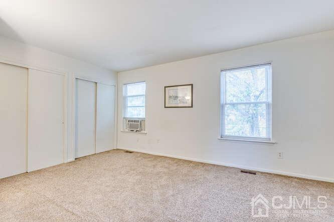114 Redbud Road Piscataway, NJ 08854 - Photo 17 of 28 an empty room with windows