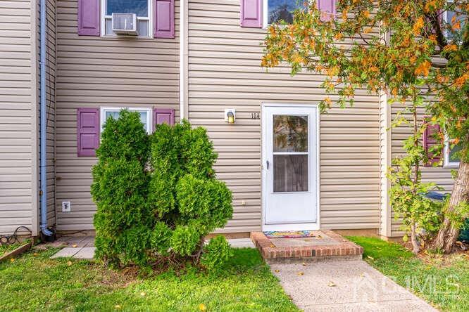 114 Redbud Road Piscataway, NJ 08854 - Photo 3 of 28 a front view of a house with garden