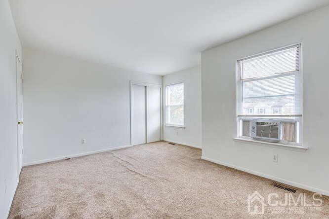 114 Redbud Road Piscataway, NJ 08854 - Photo 21 of 28 a view of an empty room with a window