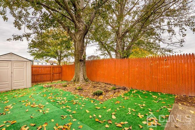 114 Redbud Road Piscataway, NJ 08854 - Photo 23 of 28 a view of a yard with a tree