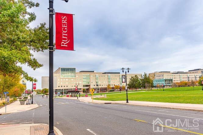 114 Redbud Road Piscataway, NJ 08854 - Photo 28 of 28 a view of a street with a building and a big yard