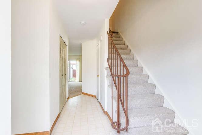 114 Redbud Road Piscataway, NJ 08854 - Photo 4 of 28 a view of a hallway with staircase