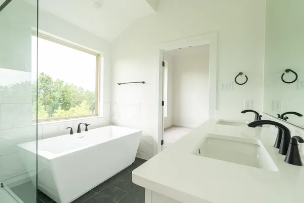 a bathroom with a sink and a bathtub
