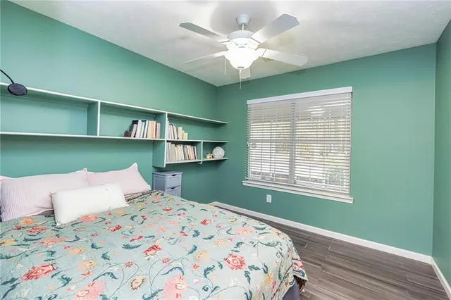 a bedroom with a bed and closet