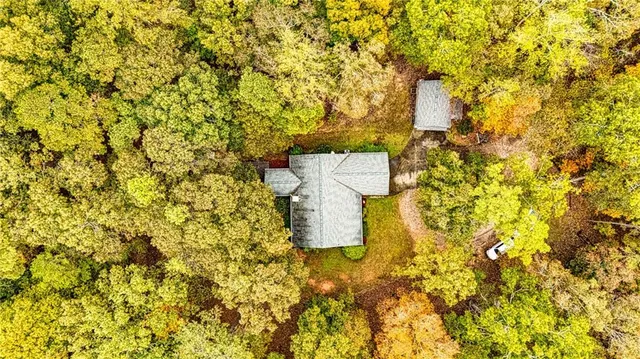 a view of a field with an outdoor space
