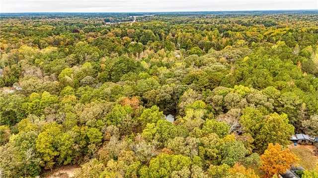 a view of a field with an outdoor space