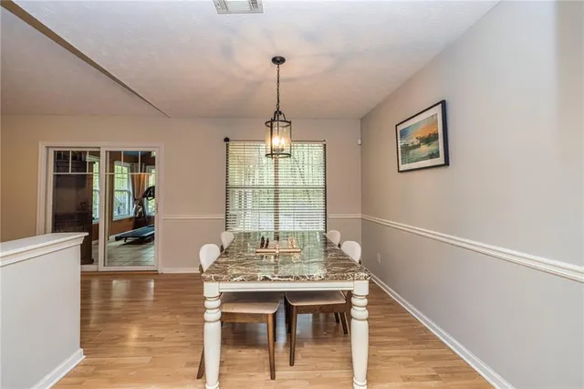 a view of a dining room with furniture